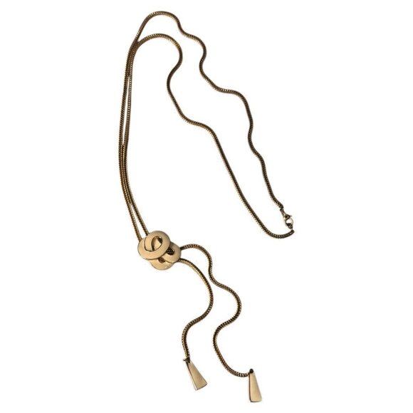 VINTAGE MONET GOLD TONE SLIDE NECKLACE with TASSEL LIKE ENDINGS - Picture 1 of 6